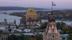 The skyline of old historic Quebec City with the St.Lawrence valley and the Island of Orleans, in the background, on Oct. 2, 2001. (CP / Jacques Boissinot)