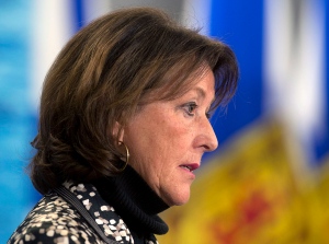 Education Minister Karen Casey fields a question at a news conference in Halifax on Wednesday, Feb. 19, 2014. (Andrew Vaughan / THE CANADIAN PRESS)