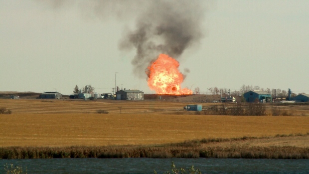 The fire at a Saskatchewan gas facility can be seen raging, emergency crews have ordered a 3km radius evacuation following an explosion that sparked the blaze. Oct. 11, 2014.