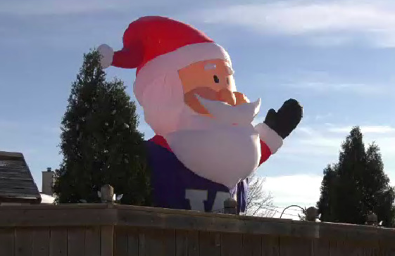 14 foot inflatable Santa is decked out in a Bomber jersey to show support  ahead of Sunday's Grey Cup showdown. | CTV News