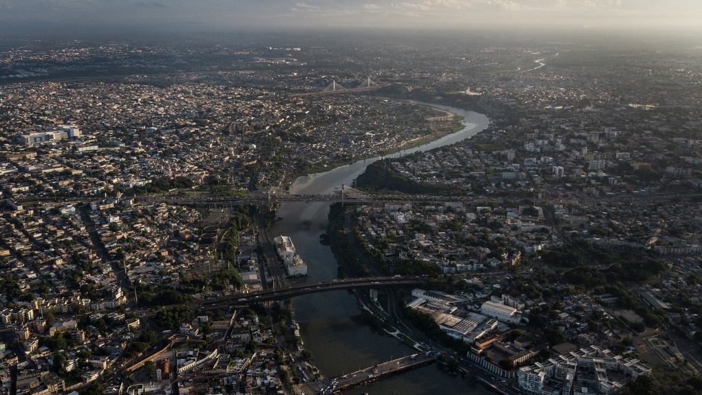 The Ozama river runs through Santo Domingo, Dominican Republic, Wednesday, July 28, 2021. (AP Photo/Matias Delacroix)