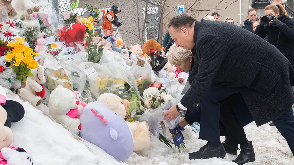 White flags, stuffed animals mark deadly bus crash site at Laval daycare, premier offers condolences