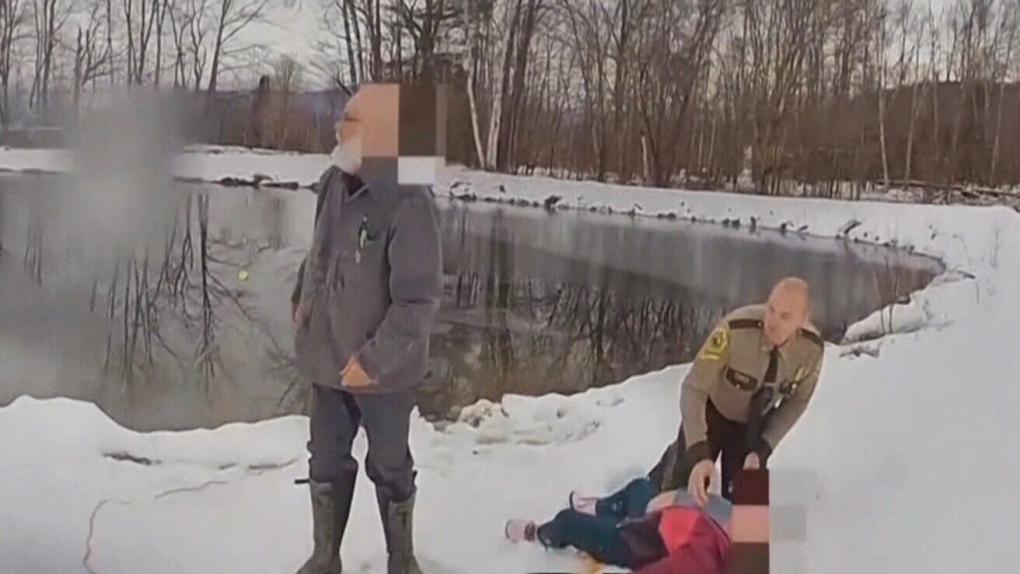 Officer jumps into icy pond to save young girl
