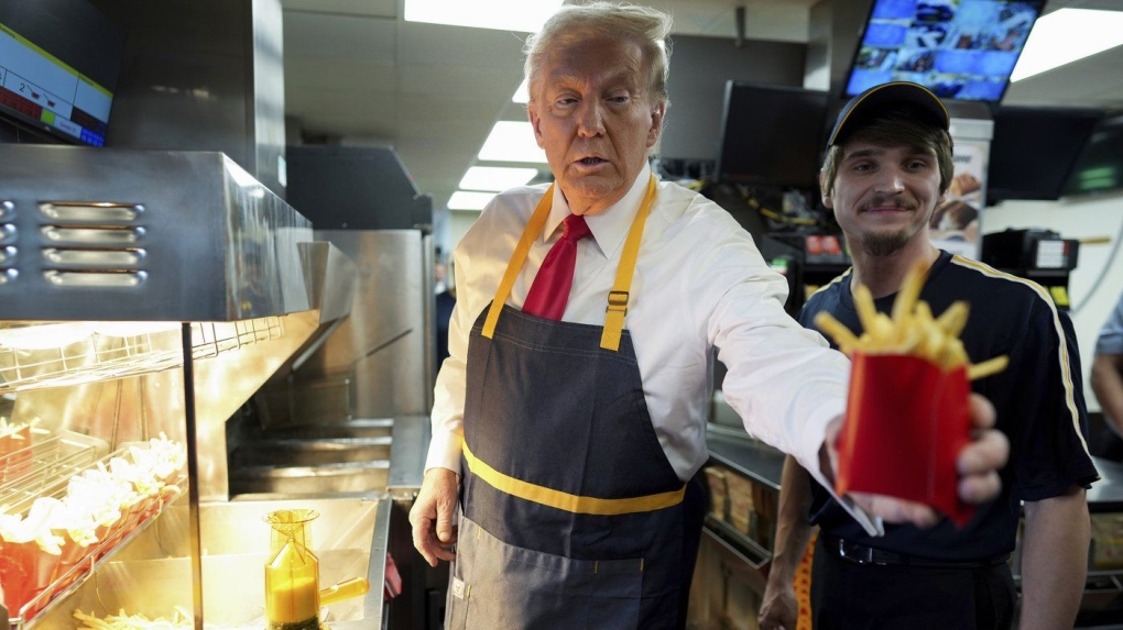 Trump works fry station, holds news conference