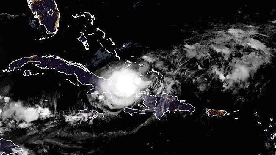 Oscar storm dumps rain on Cuba, heads towards Bahamas