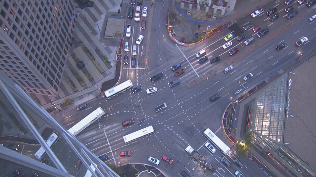 Stalled semi delaying traffic on Portage and Main