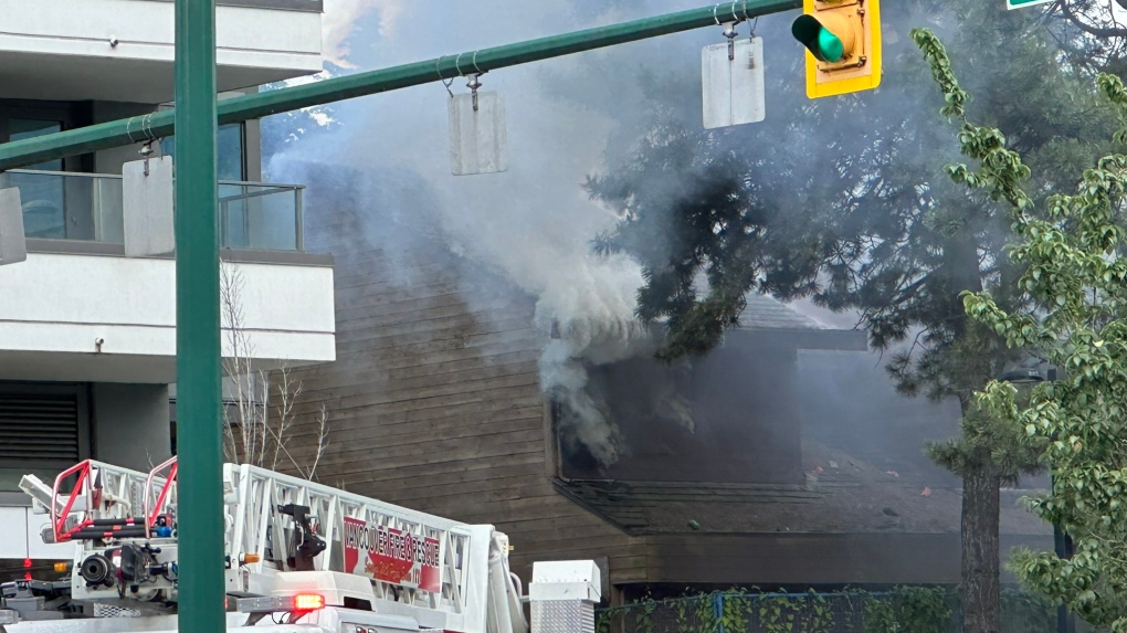 One taken to hospital after fire at abandoned townhouse complex in South Vancouver