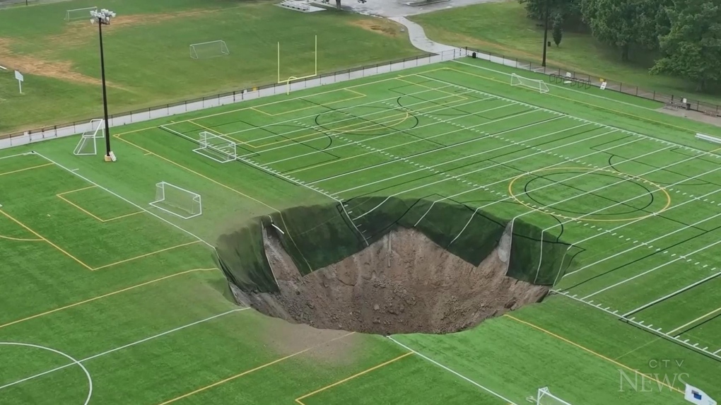 Giant sinkhole opens on soccer field