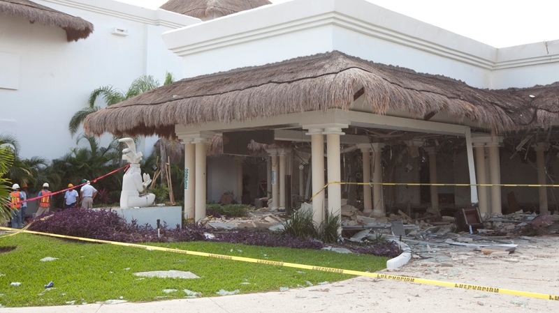 Caution tape surrounds the area damaged by an explosion at the Grand Princess Riviera Hotel in Playa del Carmen, Mexico, Tuesday, Nov. 16, 2010. (Jonathan Hayward / THE CANADIAN PRESS)  
