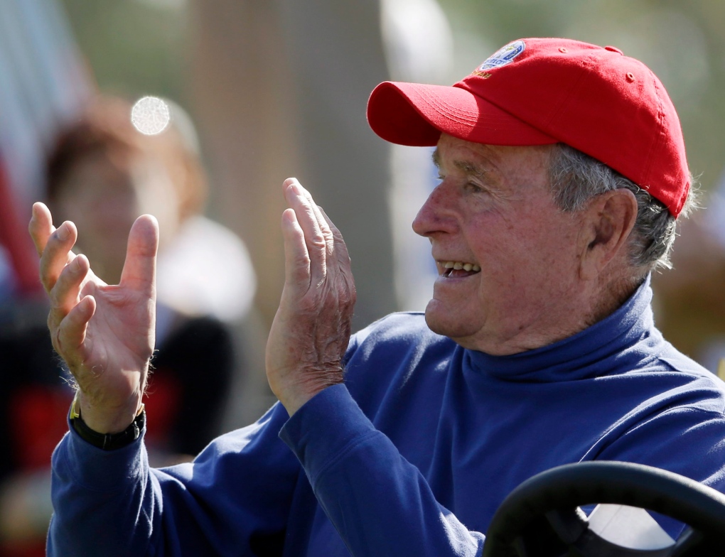 Former U.S. President Bush remains hospitalized 