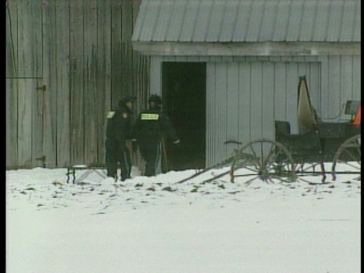 Ontario SPCA investigators are seen at a farm in the area of Listowel, Ont. in February 2012.