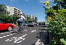 A bicyclist rides along Salt Lake City's separated bikeway in this June 2012 file photo. (AP Photo/Al Hartmann/The Salt Lake Tribune) 