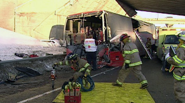 Emergency crews respond to a two-bus collision in Gatineau, Thursday, Feb. 3, 2011.