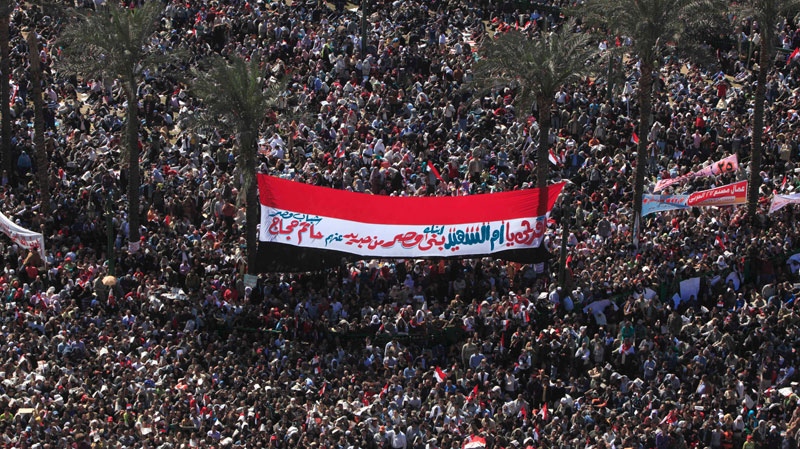 Thousands attend Friday prayers and a demonstration in Tahrir Square in Cairo, Egypt, Friday Feb. 18, 2011. (AP / Amr Nabil)