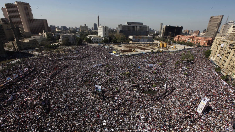 Thousands gather in Tahrir square for Friday prayers and a demonstration in Cairo, Egypt, Friday Feb. 18, 2011. (AP Photo/Enric Marti)