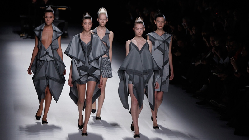 Models wear creations from designer Issey Miyake, as part of its Fall-Winter, ready-to-wear 2012 fashion collection, during Paris Fashion week, Friday, March 4, 2011. (AP Photo/Joel Ryan)