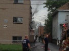 Windsor firefighters put out a blaze at 3547 Sandwich St. in Windsor, Ont., on Thursday, June 13, 2013. (Dan Appleby / CTV Windsor)