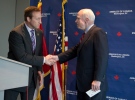 Sen. John McCain, R-Ariz., shakes hands with Canadian Defense Minister Peter MacKay during a news conference at the Canadian embassy in Washington, Tuesday, June 18, 2013. (AP / Manuel Balce Ceneta)