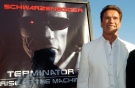 Arnold Schwarzenegger, star of the new film "Terminator 3: Rise of the Machines," is pictured next to the film's poster at the world premiere of the film in the Westwood section of Los Angeles in this June 30, 2003 file photo. (AP / Chris Pizzello)