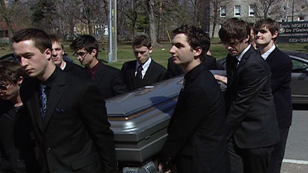 Friends carry the casket of Anthony McColl, Monday, April 25, 2011.