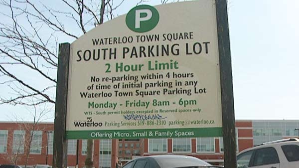 A sign indicates the rules at a City of Waterloo parking lot at the Waterloo Town Square on Wednesday, May 11, 2011.
