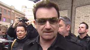 Bono signed autographs outside the Burton Cummings Theatre Saturday evening.