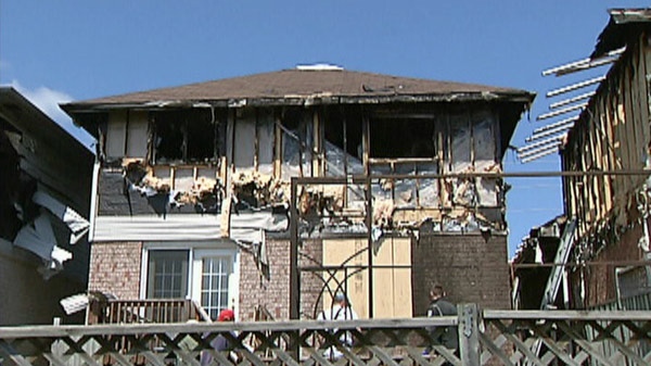 Four homes were damaged in an early morning fire on Grange Road in Guelph, Ont. on Saturday, July 23, 2011.