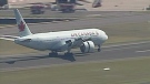 Air Canada flight AC34 lands safely at Sydney Airport on Thursday, July 28, 2011.
