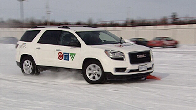 CTV's Eric Longley tries driving on ice at the MCO Winter Driving School. The pylon survived.