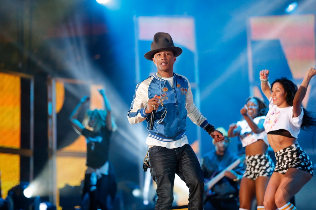 Pharrell's 'Happy' and 'Frozen' soundtrack top iTunes end-of-year list |  CTV News
