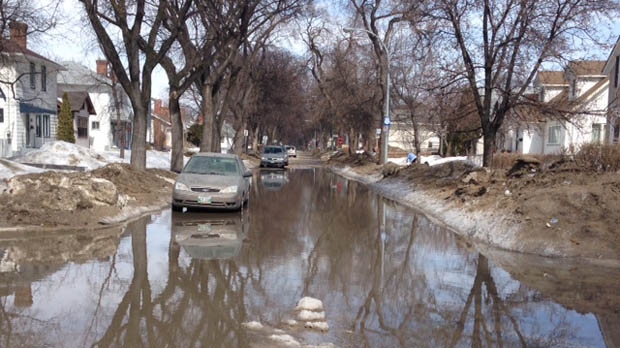 Spruce Street residents waiting for street to drain | CTV News