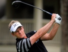 Luke Donald, of England, watches his shot off the eighth tee during the third round of the RBC Heritage golf tournament in Hilton Head Island, S.C., Saturday, April 19, 2014. (AP / Stephen B. Morton)