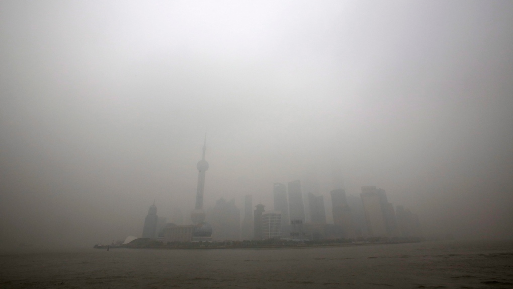 Shanghai, China skyline shrouded by smog