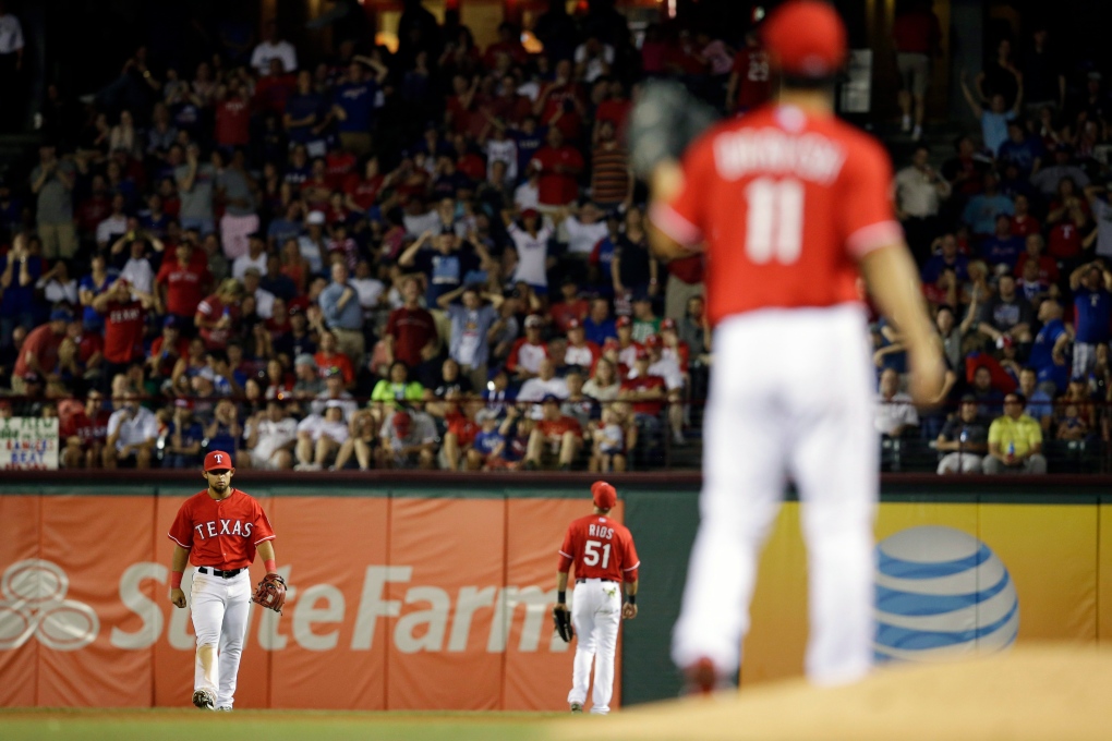 Baseball debate: Hit or error when routine fly drops between fielders? |  CTV News