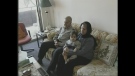 Adnan Abed watches news from Iraq with his family in London, Ont. on Thursday, June 12, 2014.
