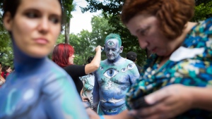 Nude models, artists hit NYC streets after legal fight over body painting |  CTV News