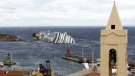 The grounded cruise ship Costa Concordia lies on its side off the Tuscan island of Giglio, Italy, Wednesday, Feb. 1, 2012. (AP Photo/Pier Paolo Cito)