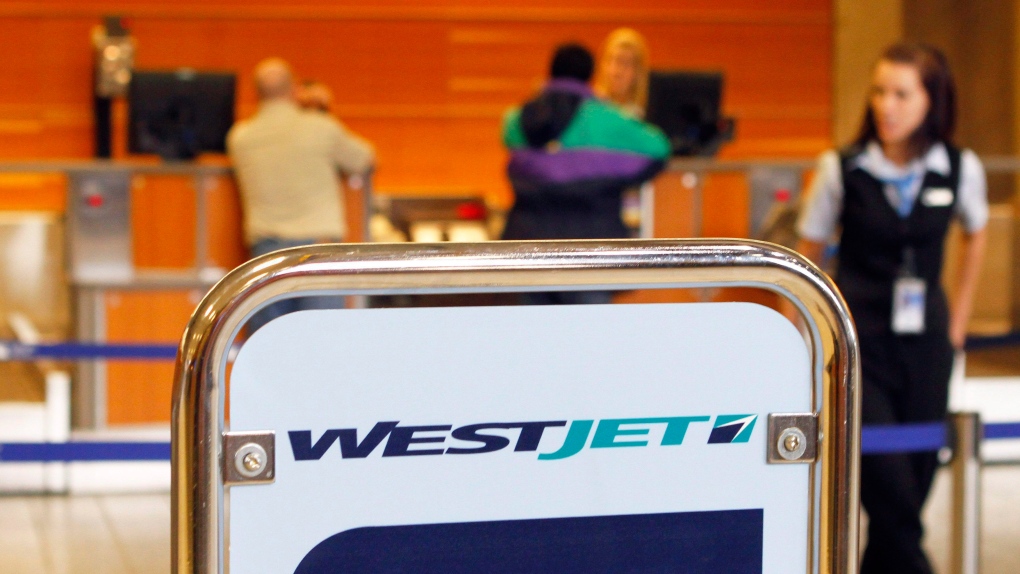 WestJet extends first checked bag fee across its international network |  CTV News