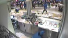 Surveillance video shows Christopher Husbands pointing a gun at the Toronto Eaton Centre on June 2, 2012. 