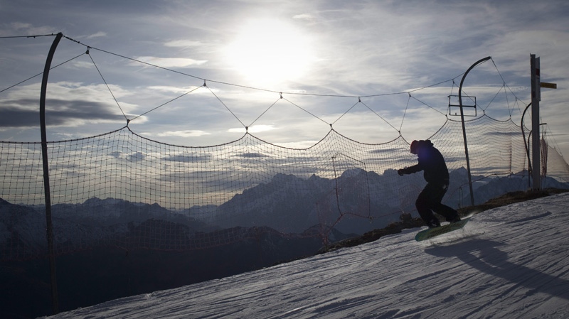In this Dec 1, 2011 file photo, a snowboarder is seen on the slopes in Verbier, Switzerland. (AP Photo/Anja Niedringhaus)