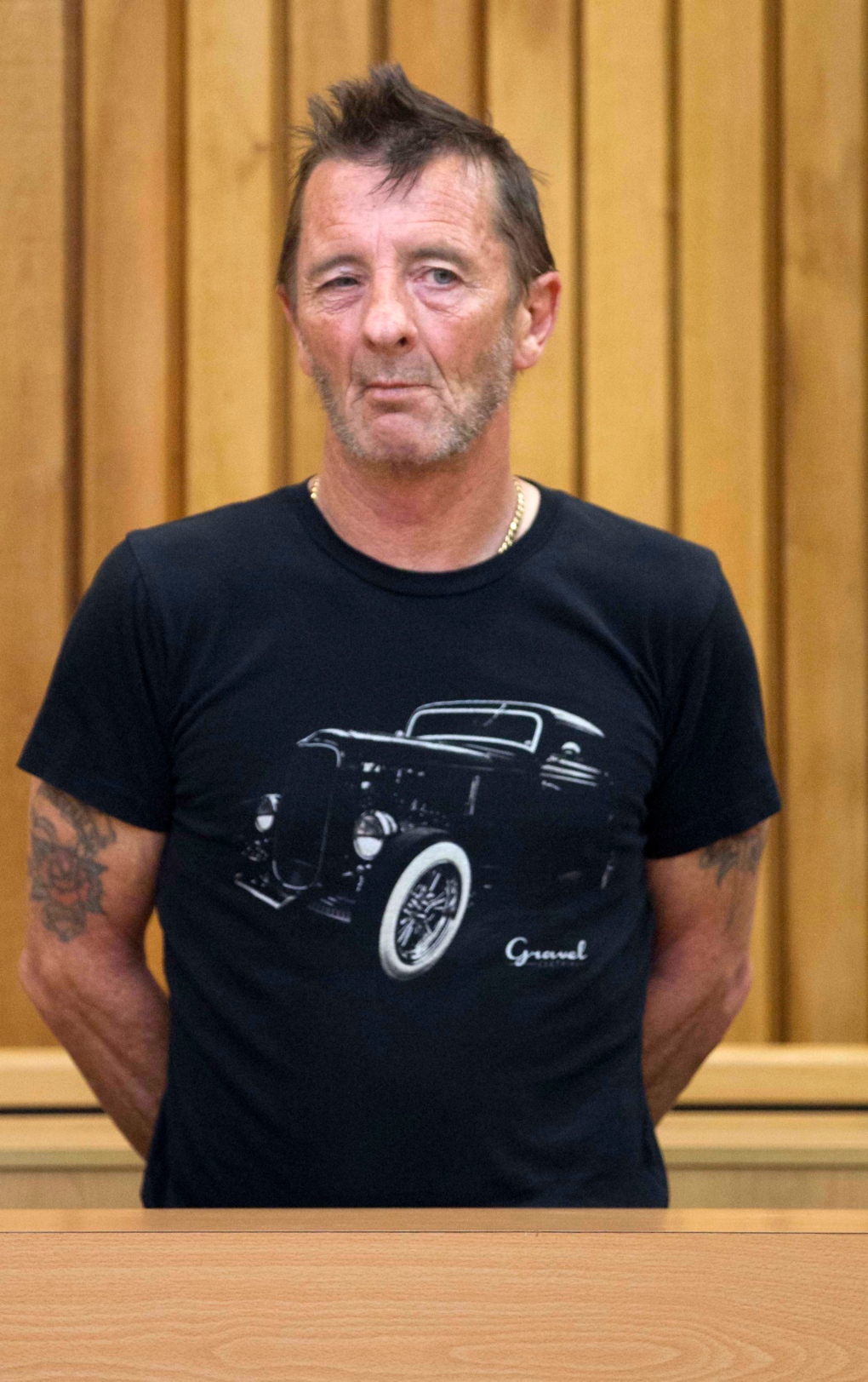 AC/DC drummer Phil Rudd clowns around outside New Zealand courthouse | CTV  News