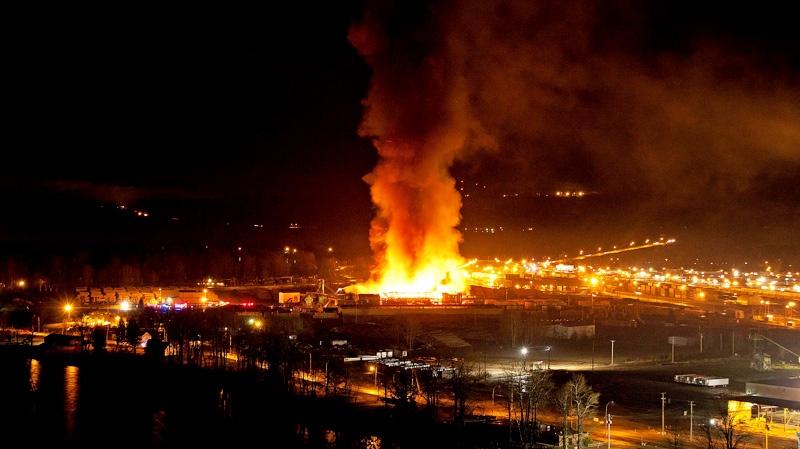 A large fire burns at the Lakeland Mills sawmill in Prince George, B.C., on April 24, 2012. (Andrew Johnson / THE CANADIAN PRESS)