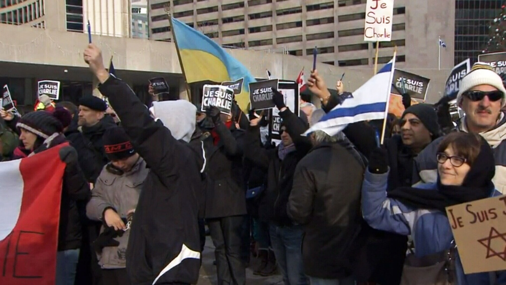 Hundreds rally downtown in solidarity with those killed in Paris | CTV News