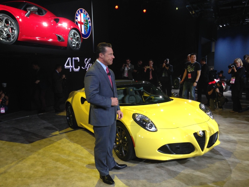 Reid Bigland, Head of Alfa Romeo North America, shows off the Alfa Romeo 4C Spider at the auto show in Detroit, Jan. 12, 2015. (Melanie Borrelli / CTV Windsor)