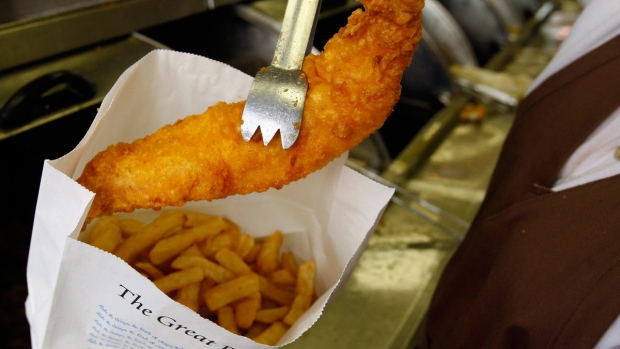 Serving up fish and chips in London, England