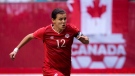 FILE - Canada's Christine Sinclair chases down the ball in a game against Germany, in Vancouver, B.C., on Wednesday, June 18, 2014. (THE CANADIAN PRESS/Darryl Dyck)