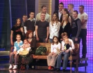This photo taken in 2005 shows then 55-year-old Annegret Raunigk (1st row, 2ndL) with her children and grand-children being interviewed on Germany's RTL television channel. (AFP/File / Jörg Carstensen)