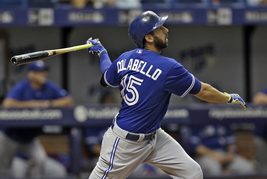 Toronto Blue Jays' Edwin Encarnacion hits a broken bat pop-out