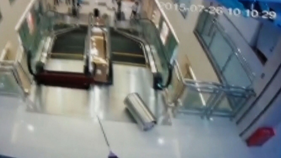 Chinese woman killed in escalator accident pushed son to safety | CTV News
