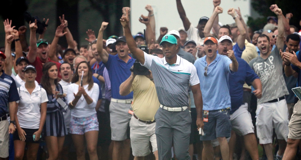 Tiger Woods opens Wyndham Championship with 64, best round in 2 years